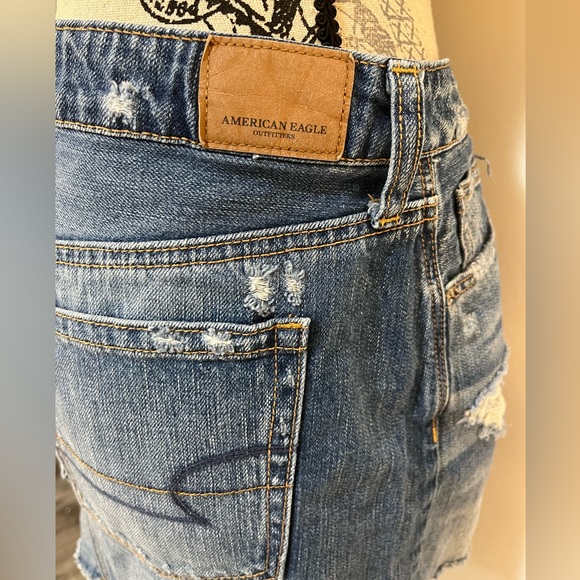 AMERICAN EAGLE Denim Distressed Button-fly Mini Skirt. - Picture 4 of 7